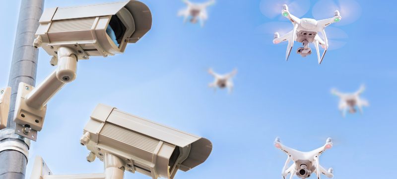 Low Angle View Of Four Security Camera Installed On Pole